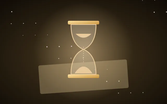 An hourglass and old map